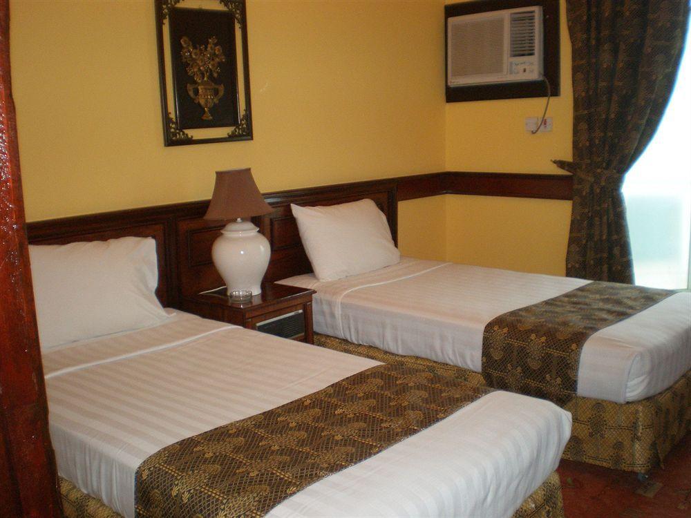 Concord International Hotel Manama Oda fotoğraf