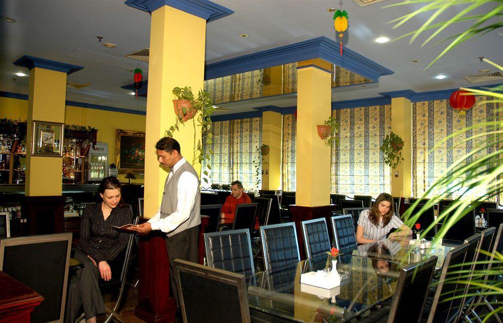 Concord International Hotel Manama Restoran fotoğraf