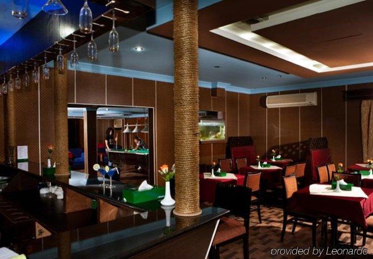 Concord International Hotel Manama Restoran fotoğraf